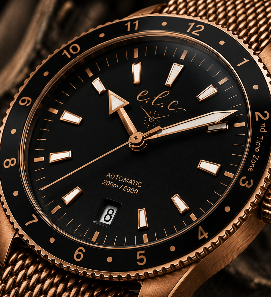 Close-up of an E.L.C. luxury mechanical watch with black dial and gold detailing