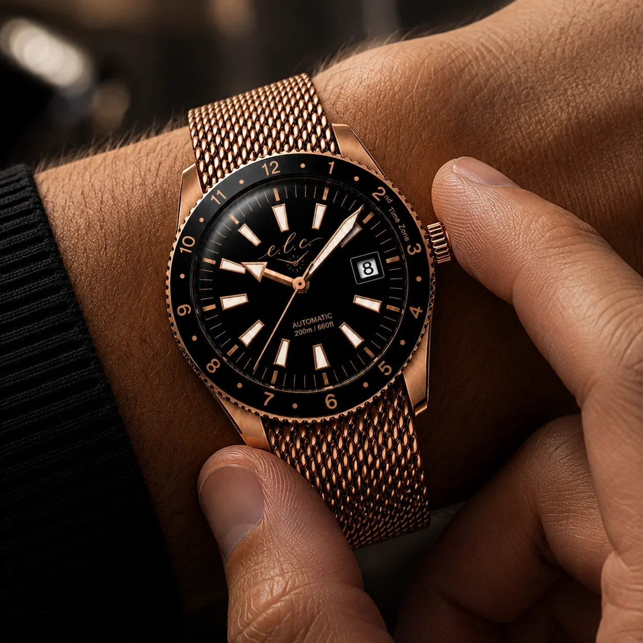 ELC luxury watch with rose gold mesh strap worn on wrist