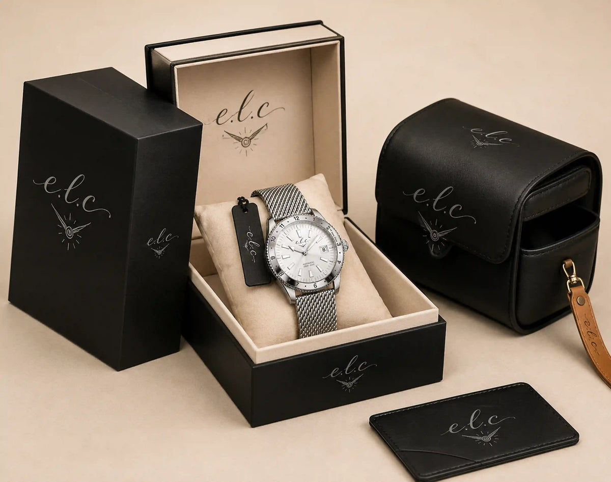 E.L.C. Riviera Signature Silver White watch displayed in its branded box with a travel pouch, packaging, and accessories.